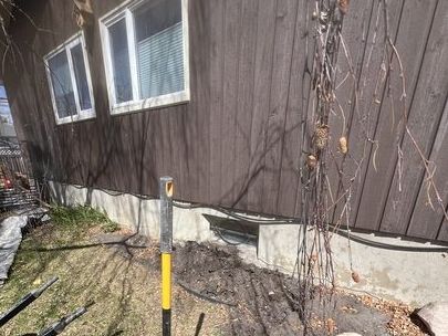 Small basement window before excavation and enlargement.