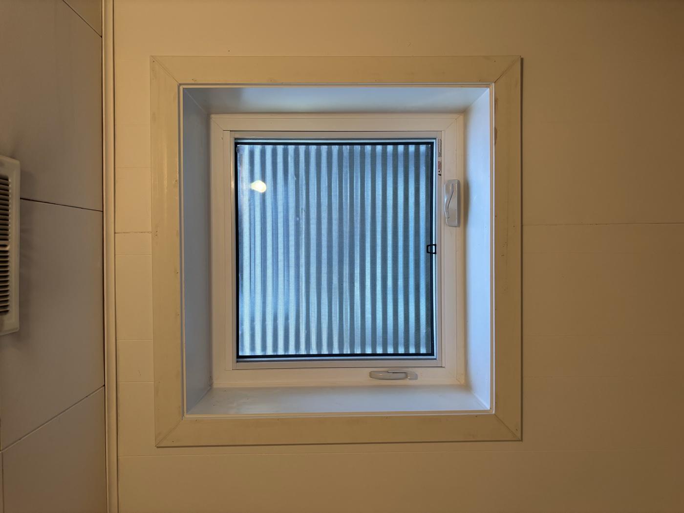 Clean interior window finish — egress installation Calgary basement